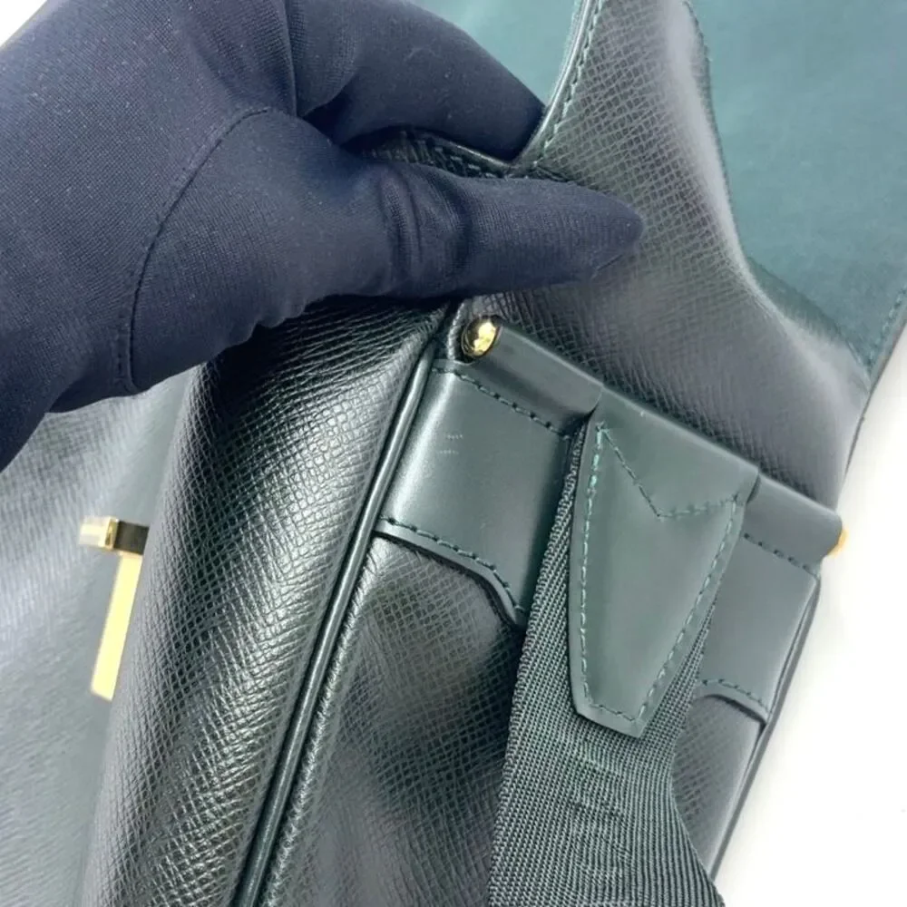 Louis Vuitton Yaranga Taiga Leather Shoulder Bag